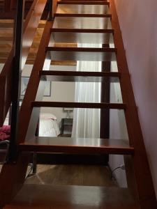 un conjunto de escaleras en una casa en OpenSpace Vista Panoramica, en Abetone