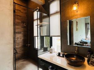 Koupelna v ubytování Zephyr Homestay