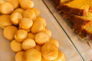 a pile of buns and bread in a display case at Hotel Nettuno in Ischia