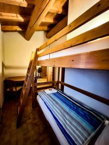 Rúm í herbergi á Albergo Ristorante Selva