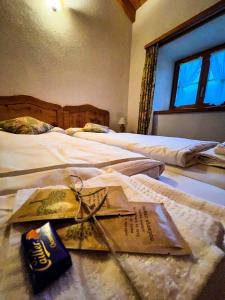 Rúm í herbergi á Albergo Ristorante Selva