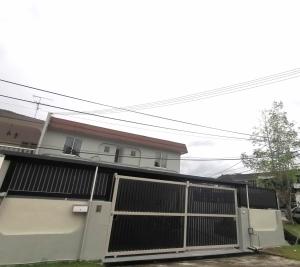 a house with a gate in front of it at ₘₐcₒ ₕₒₘₑ【Private Room】@Sentosa 【Southkey】【Mid Valley】 in Johor Bahru +16 photos