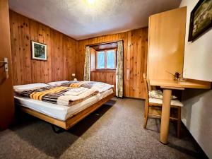 Rúm í herbergi á Albergo Ristorante Selva