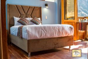 Letto o letti in una camera di Pisonay Hotel