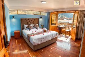 Letto o letti in una camera di Pisonay Hotel