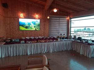 a room with a table with a white table cloth at H&ocirc;tel Volubilis Mekn&egrave;s in Mekn&egrave;s