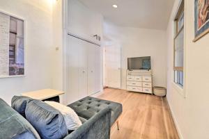 a living room with a couch and a television at Nevada City Escape Near Dtwn and Pioneer Park! in Nevada City