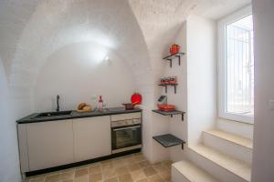 Kuchyň nebo kuchyňský kout v ubytování Masseria La Scalella - Cisterna