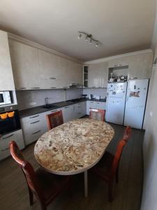 Kuchyň nebo kuchyňský kout v ubytování Garni Guesthouse