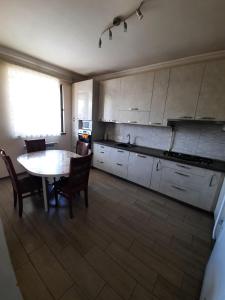 Kuchyň nebo kuchyňský kout v ubytování Garni Guesthouse