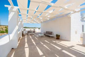 A balcony or terrace at Masseria La Scalella - Fortificato