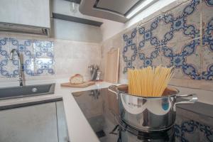 A kitchen or kitchenette at Masseria La Scalella - Fortificato