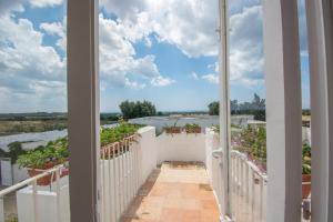 A balcony or terrace at Masseria La Scalella - Fortificato