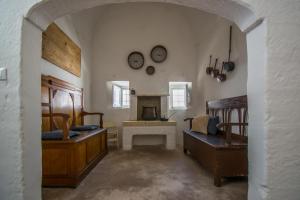 A seating area at Masseria La Scalella - Fortificato