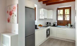 Kuchyň nebo kuchyňský kout v ubytování CASA ISABEL