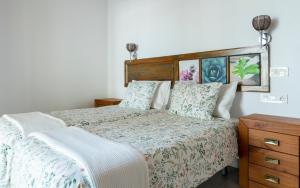 Postel nebo postele na pokoji v ubytování CASA ISABEL