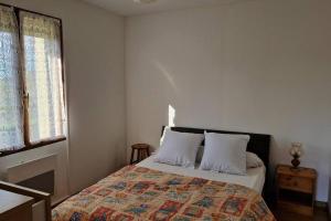 Posteľ alebo postele v izbe v ubytovaní Appartement au calme, vue Pic du Midi