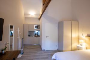Cama o camas de una habitación en Auberge des Grands Bois