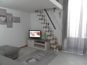 A television and/or entertainment centre at Casa Catania Inn