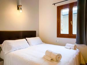 Llit o llits en una habitació de Disfruta De La Naturaleza - Vistas al Rio - Luz Natural - 6pax