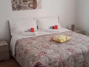 Postel nebo postele na pokoji v ubytování Residenza Somma