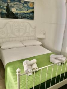 A bed or beds in a room at Il sottano alla strada Polignano a mare