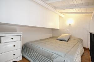 A bed or beds in a room at Romacentrarte