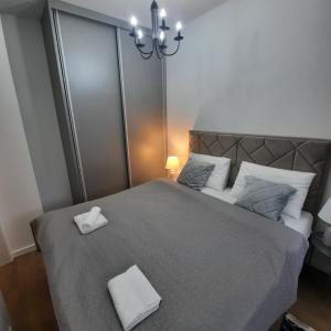 Кровать или кровати в номере Apartman Andjelina
