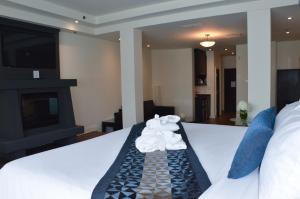 Postel nebo postele na pokoji v ubytování Sterling Inn & Spa