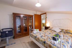 Giường trong phòng chung tại B&B delle Meraviglie Salerno-Baronissi-Pellezzano