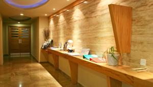 Vstupní hala nebo recepce v ubytování Poseidonia Beach Hotel