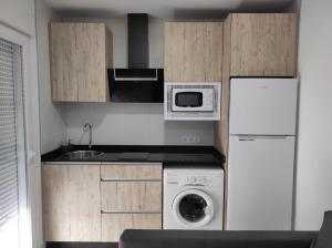 Kuchyňa alebo kuchynka v ubytovaní Belice, excepcional apartamento con Jacuzzi + 1 fotografia
