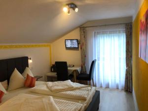 Postel nebo postele na pokoji v ubytování Schlossnerhof