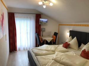 Postel nebo postele na pokoji v ubytování Schlossnerhof