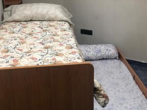 A bed or beds in a room at 110 square meters, 5 min of all-Best area of Las Palmas