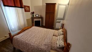 Кровать или кровати в номере Bel appartement proche Paris 3 chambres