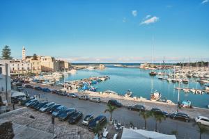 a marina with a bunch of boats in the water at Michè luxury home - Appartamento vista mare a Trani in Trani