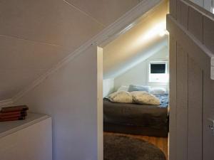 Postel nebo postele na pokoji v ubytování Holiday home Brastad XVII