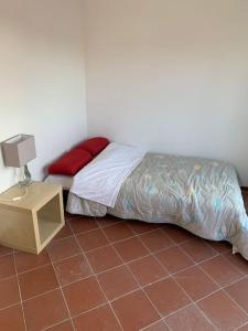 Postel nebo postele na pokoji v ubytování Appartamento centrale con giardino e posto