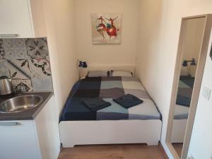 Posteľ alebo postele v izbe v ubytovaní Apartments City of Hearts 3