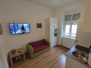 Kuchyňa alebo kuchynka v ubytovaní Apartments City of Hearts 3