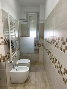 Koupelna v ubytování Bi Zeta House: appartamento incantevole a Torino