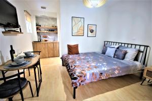 Postel nebo postele na pokoji v ubytování Studio apartman MarMar