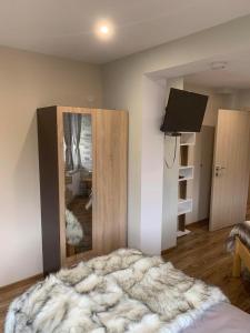 TV a/nebo společenská místnost v ubytování House Proctor