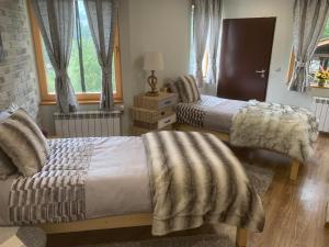 A bed or beds in a room at House Proctor