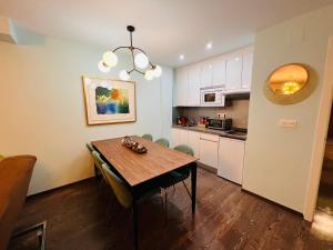 A kitchen or kitchenette at Pradollano LUXUS Grandes vistas