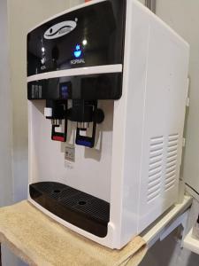 a coffee maker sitting on top of a counter at The b'Hotel in Kajang