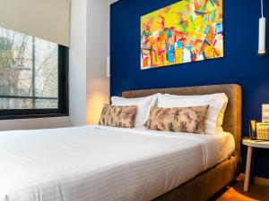 Postel nebo postele na pokoji v ubytování Iasonos Suites Athens