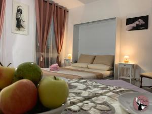 A bed or beds in a room at Casa Julka