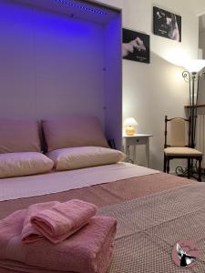 A bed or beds in a room at Casa Julka